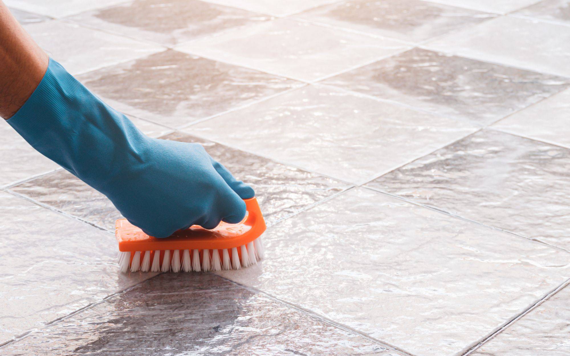 Cleaning On The Tile Floor.