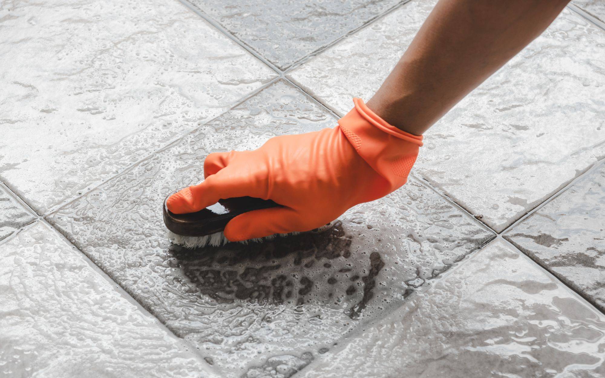 Scrub Cleaning On The Tile Floor
